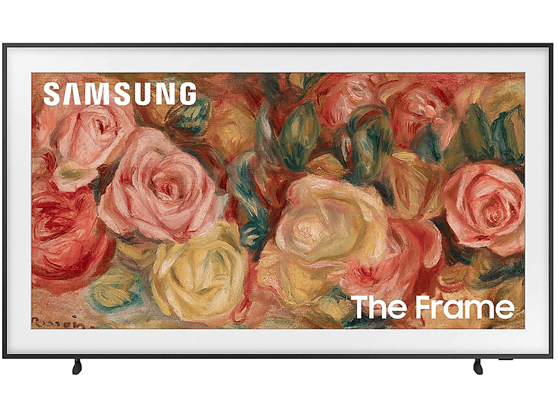 Una TV Samsung QLED da 65 pollici è appesa a una parete bianca, circondata da un ambiente elegante con un divano grigio e un tappeto chiaro. La stanza è ben illuminata e accogliente.