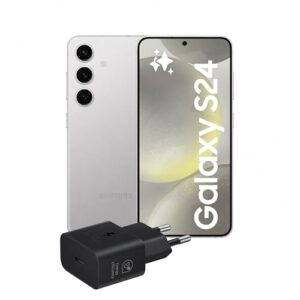 Un elegante smartphone Samsung Galaxy S24 è appoggiato su una superficie chiara, accanto a un caricatore. Lo schermo mostra un'immagine vivace e colorata, mentre il caricatore è ben visibile.