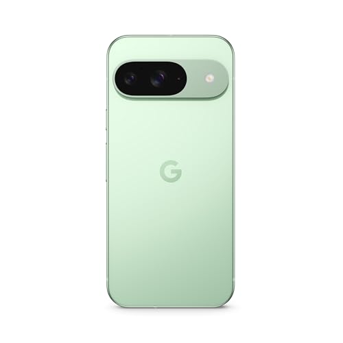 Un Google Pixel 9 è appoggiato su una superficie chiara, con la fotocamera in evidenza. Sullo sfondo, si intravedono oggetti domestici e un ambiente luminoso.